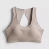 Top scurt de performanță Bodysculpt cu decupaje Top scurt de performanță Bodysculpt cu decupaje