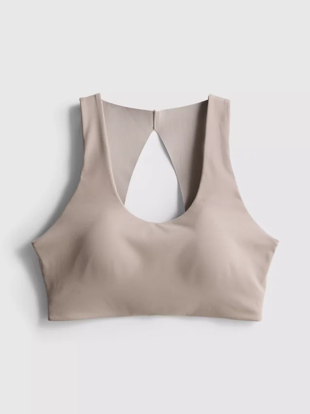 Top scurt de performanță Bodysculpt cu decupaje Top scurt de performanță Bodysculpt cu decupaje