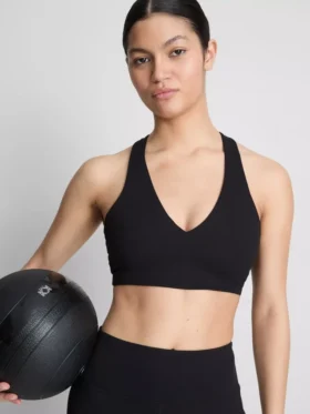 Top scurt sport cu decolteu în V, care oferă susținere