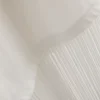 Tricou asimetric din bumbac cu franjuri