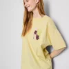 Tricou oversized din bumbac, în stil boyfriend, cu imprimeu grafic