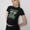 Tricou pentru bebeluși din bumbac, de culoare verde, cu volane Tricou pentru bebeluși din bumbac, de culoare verde, cu volane