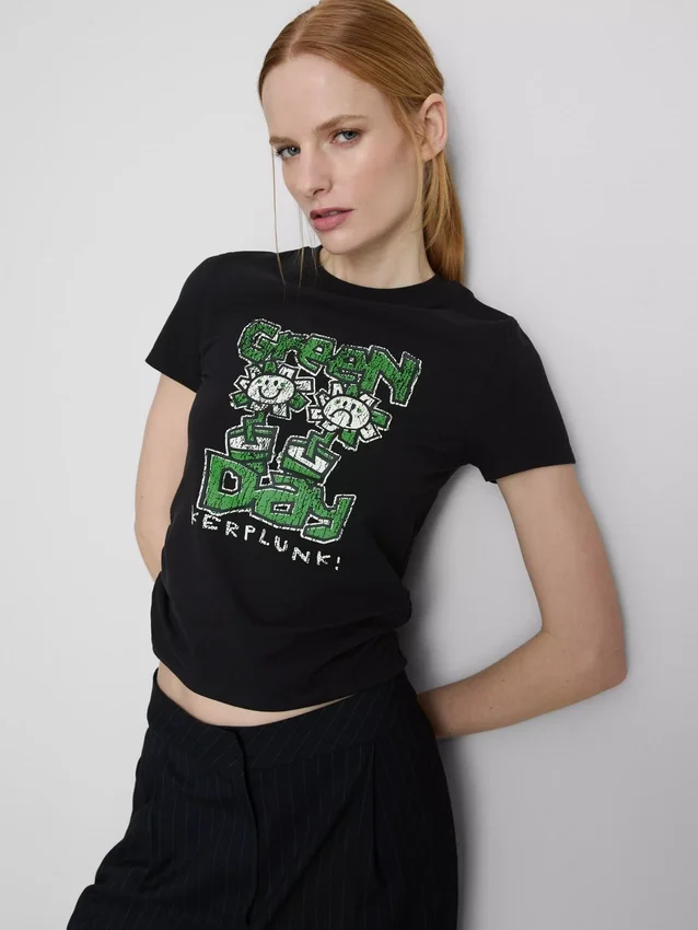 Tricou pentru bebeluși din bumbac, de culoare verde, cu volane Tricou pentru bebeluși din bumbac, de culoare verde, cu volane