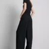Tricou pentru bebeluși din bumbac, de culoare verde, cu volane Tricou pentru bebeluși din bumbac, de culoare verde, cu volane