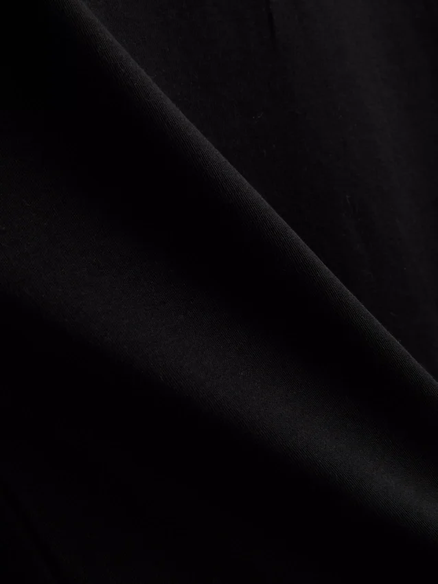 Tricou scurt, fără mâneci, cu umeri căptușiți Tricou scurt, fără mâneci, cu umeri căptușiți