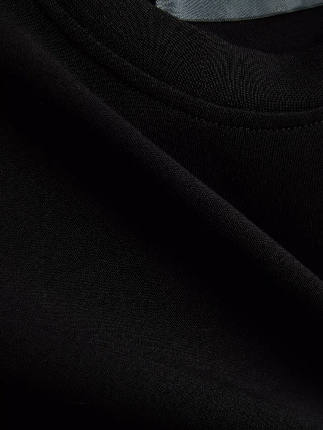 Tricou scurt, fără mâneci, cu umeri căptușiți Tricou scurt, fără mâneci, cu umeri căptușiți