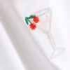 Tricou scurt pentru bebeluși, din bumbac cu mărgele Tricou scurt pentru bebeluși, din bumbac cu mărgele