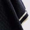 Tricoul polo cu fermoar și textură „The Edit”