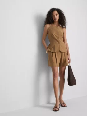 Vestă cu tiv peplum Paula Echevarría Vestă cu tiv peplum Paula Echevarría