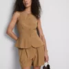 Vestă cu tiv peplum Paula Echevarría Vestă cu tiv peplum Paula Echevarría