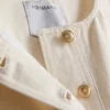 Vestă scurtă din bumbac cu buzunar frontal Vestă scurtă din bumbac cu buzunar frontal